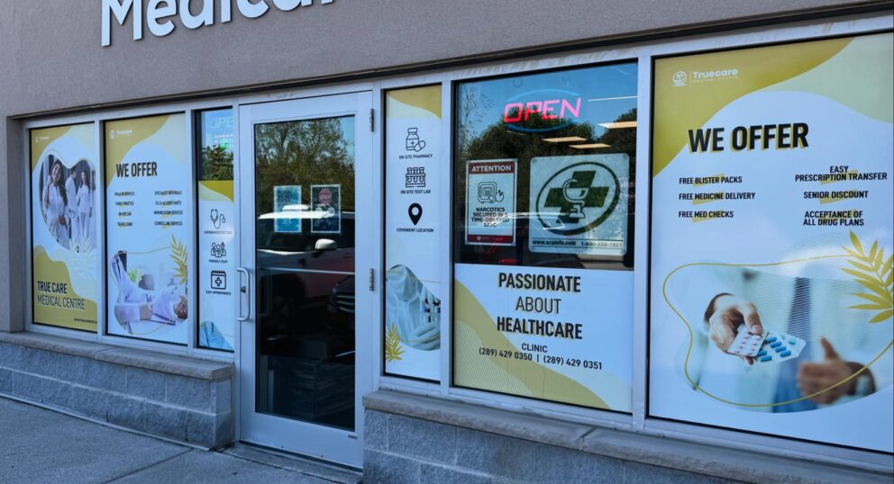 Large format vinyl banner installed on Mississauga storefront